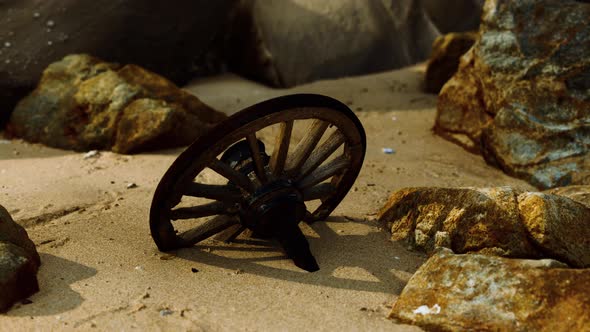 Old Wooden Cart Wheel at Sand Beach