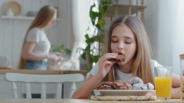 Caucasian Schoolgirl Daughter Teenager Child Eating Homemade Chocolate Tasty Biscuit Cookies with