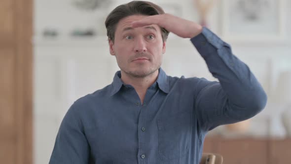 Portrait of Young Man Looking Around, Searching