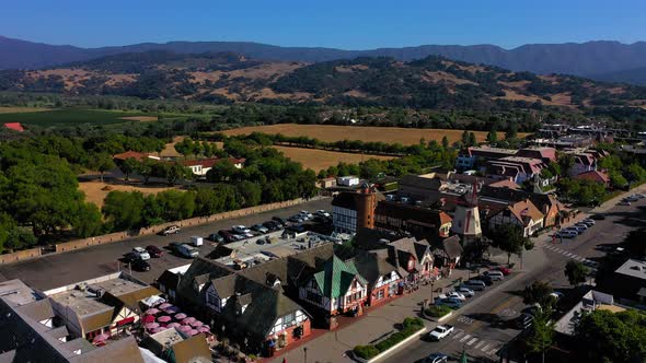 Flying towards the right of the main street in Solvang Ca