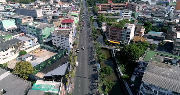 Ride into a Big City, Aerial reveal of Bangkok Skyline in Thailand. 4K DRONE