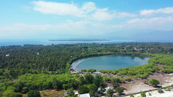 Aerial drone view panorama of perfect sea view beach lifestyle by clear lagoon with white sand backg