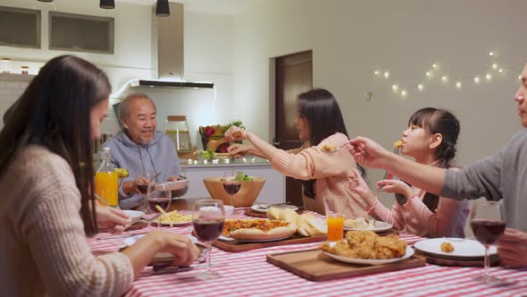 Happy family time and relationship, Asian big family having christmas party eating food together.