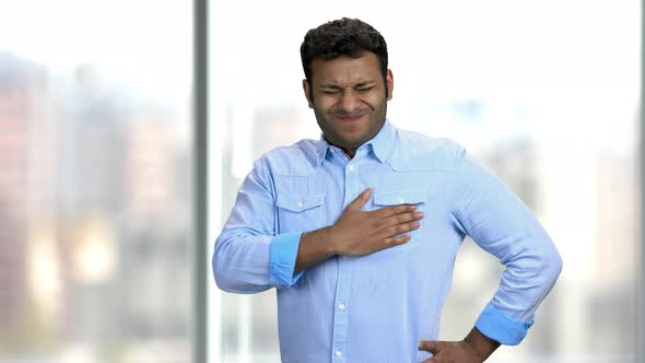 Young Indian Man Having Chest Pain