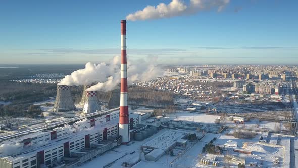 Upper View Winter Heating Station with Towers and Town