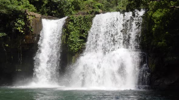 Wide shot of beautiful waterfall in tropical rainforest. Klong Chao waterfall. Koh Kood, Thailand.