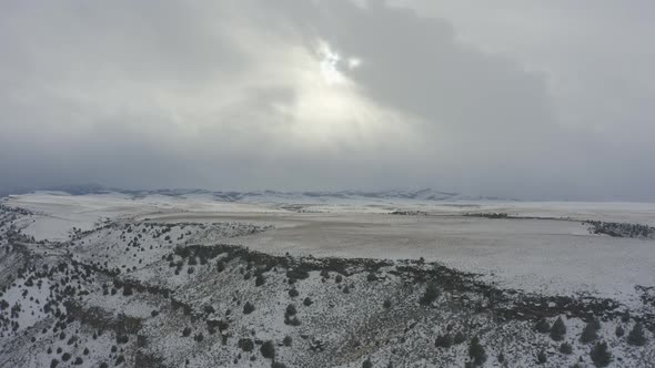 Slow tracking drone shot of snowy canyon