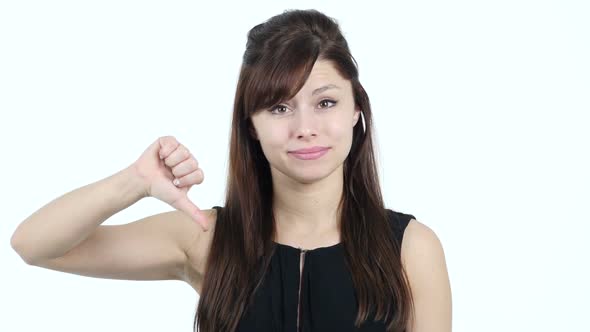 Thumbs Down by Young Girl, White Background