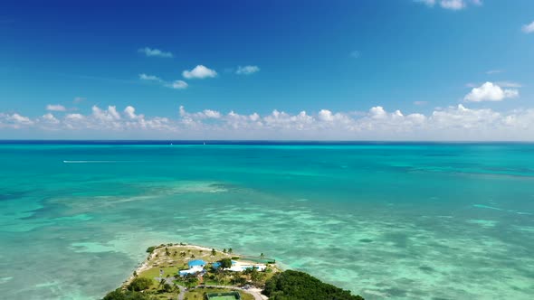 Turquoise Seascape With Caribbean Island Of Tea Table Key In Islamorada, Florida. Aerial Wide Shot