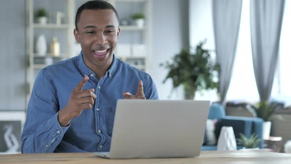 Online Video Chat on Laptop at Work