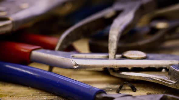 Camera dollies across old and grimy tools