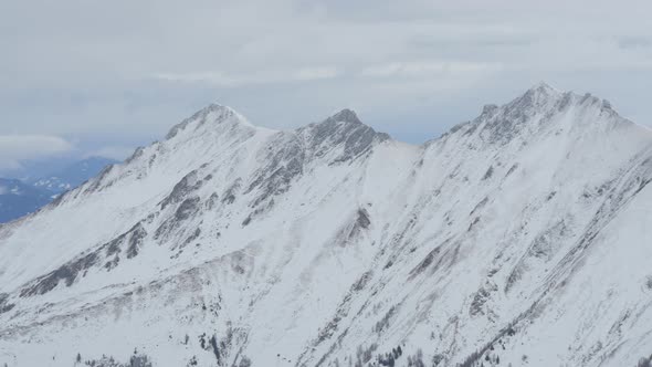 Panoramic view of cliffs covered with snow