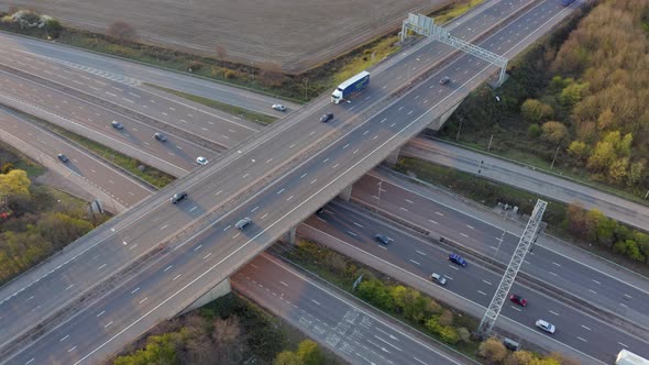 Vehicles Driving on a Freeway at Sunset Using The Junction and Bridges