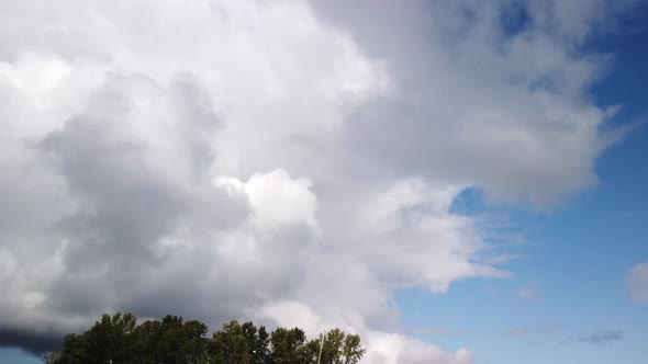 Moving time lapse, hyperlapse of rolling storm cloudsing right to left, Cumulonimbus