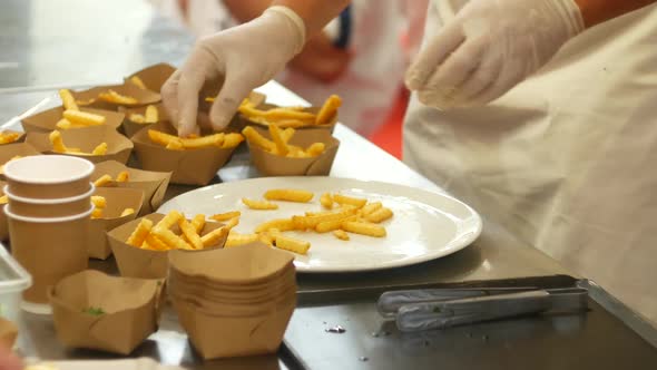 Chef Serves French Fries