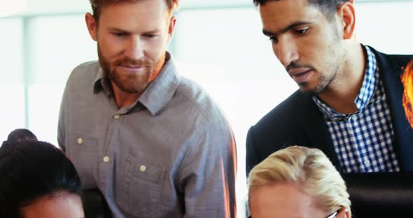 Executives working together at the desk