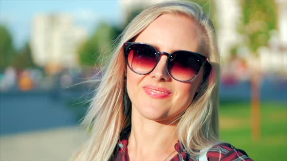 Portrait of European Cute Blonde in with Sunglass Young Happy Woman or Cheerful Girl Looking in The