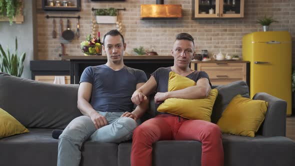 Male Gay Couple Spend Time at Home