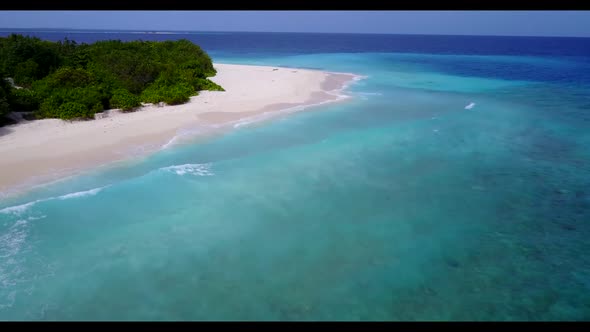 Aerial top view nature of relaxing lagoon beach adventure by blue green water and clean sand backgro