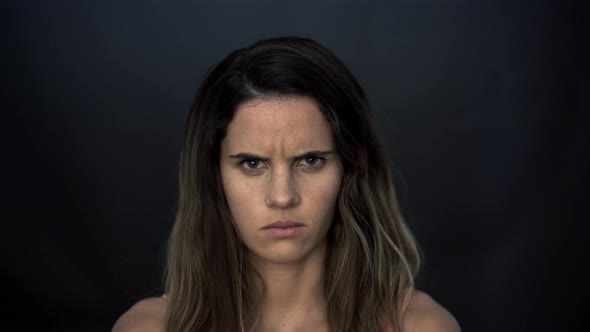 Woman with furrowed brow, portrait