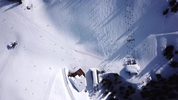 Aerial view of a ski slope in a ski resort in the Tyrolean Alps in Austria