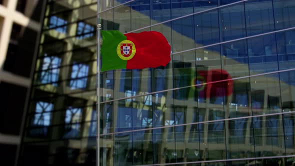 Portugal Flag Waving On A Skyscraper Building