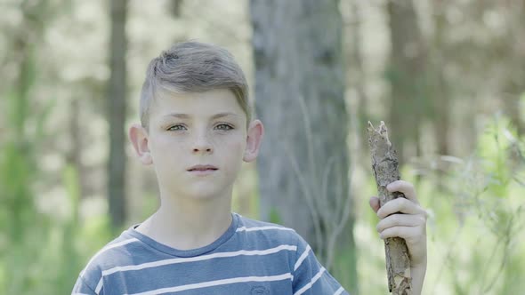 Boy in woods, portrait