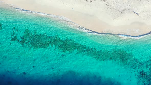 Aerial view abstract of beautiful lagoon beach lifestyle by blue ocean with white sandy background o