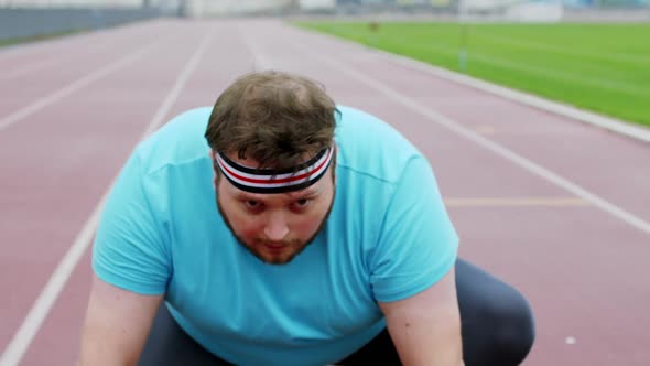 In the Stadium Good Looking Obese Guy in the Sport