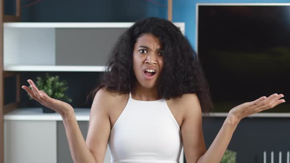 Shocked, Unpleasantly Surprised Young African American Woman Feels Disdain and Disgust. Black Girl