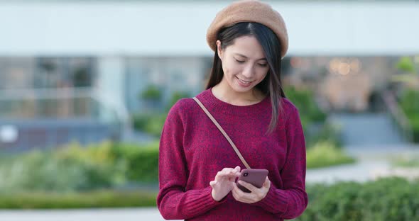 Woman Use of Mobile Phone in City