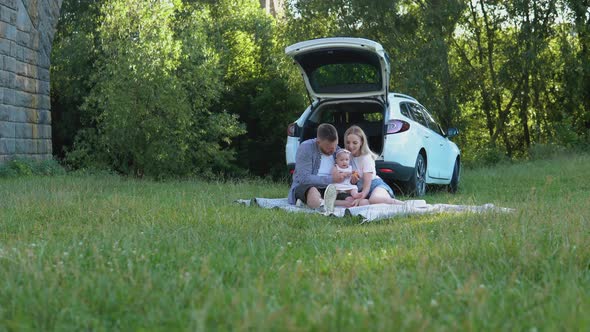 Happy Family Travels By Family Car