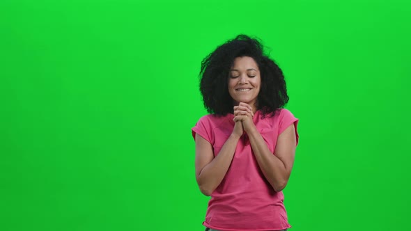 Portrait of Young Happy Female African American Dreaming of Something Pleasant