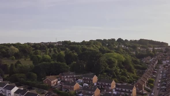 Beautiful view of woodland in Exeter, Devon next to a local residential estate.