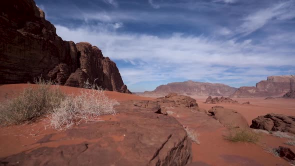 A Beautiful Timelapse of Clouds Moving Above The Desert of Wadi Rum on a Sunny and Bright Day