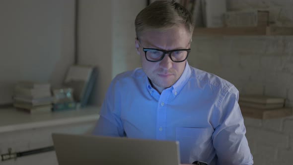 Businessman Doing Overtime at Work