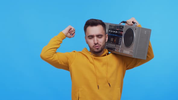 Expressive young man screaming and shouting over vibrant background.