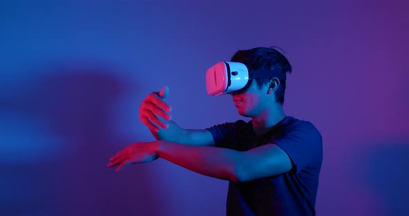 Man looking though VR device