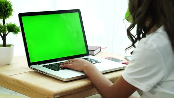 Young Woman Using Laptop 01