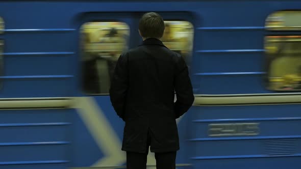 Lonely Young Man From Behind At Subway Station