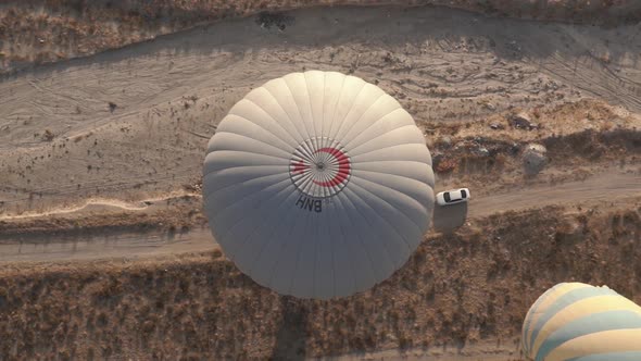 Hot Air Balloon with Signs and Letters Prepares to Takeoff