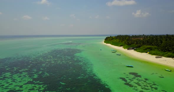 Wide overhead abstract view of a summer white paradise sand beach and aqua turquoise water background