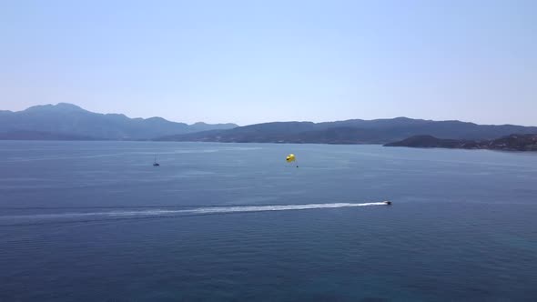 Parasailing Parasailing Behind a Boat