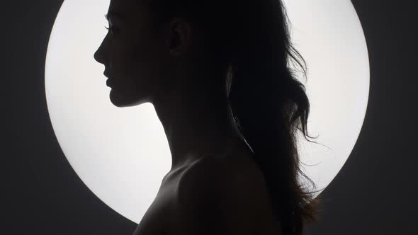 Fine Art Fashion Studio Portrait of Woman at Full Moon