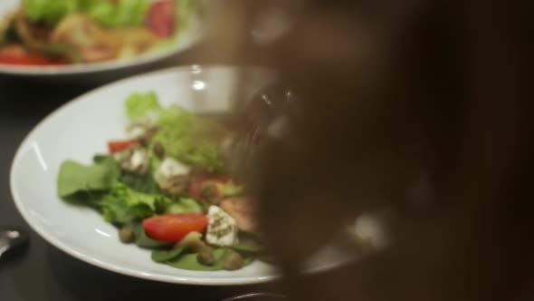 Plate Of Appetizing Salad With Shrimp Tomatoes Cheese And Lettuce