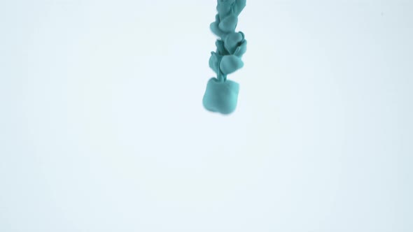 Slow motion shot of blue and orange ink into water, shot with Phantom Flex 4K camera. alt