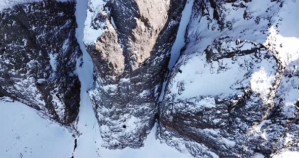 Huge Rocks Covered with Snow