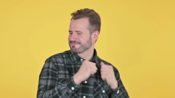 Portrait of Middle Aged Man Dancing in Joy