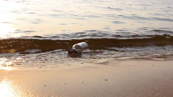 Message in the Bottle Against the Sun Setting Down