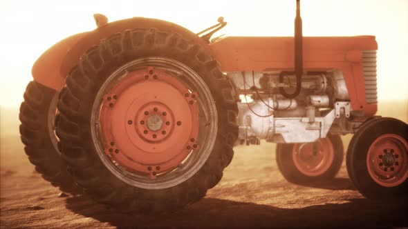 Vintage Retro Tractor on a Farm in Desert